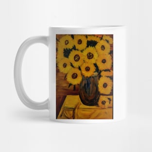 Sunflowers I'm a metallic blue gold and bronze and turquoise vase. On a table with yellow table cloth Mug